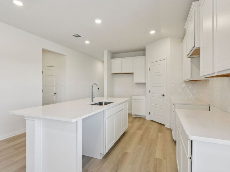 Kitchen in the Allen floorplan at a Meritage Homes community. Kitchen in the Allen floorplan at a Meritage Homes community.