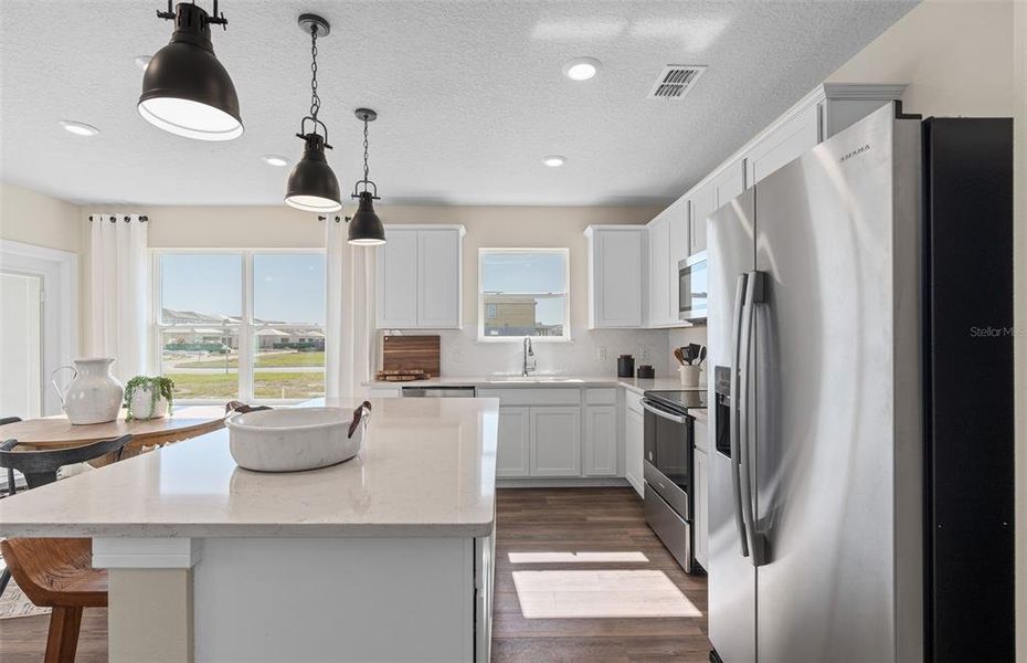 Furnished interior view inside a new home in Tohoqua, Kissimmee (Image 27).