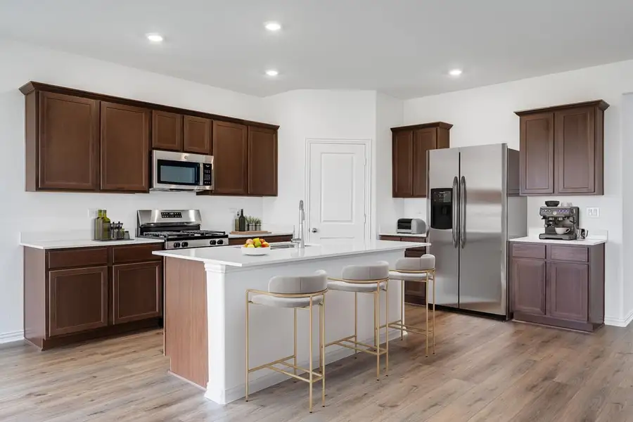Representative furnished interior of a home built from the Georgetown by Taylor Morrison in River Ridge, Crandall (Image 4).