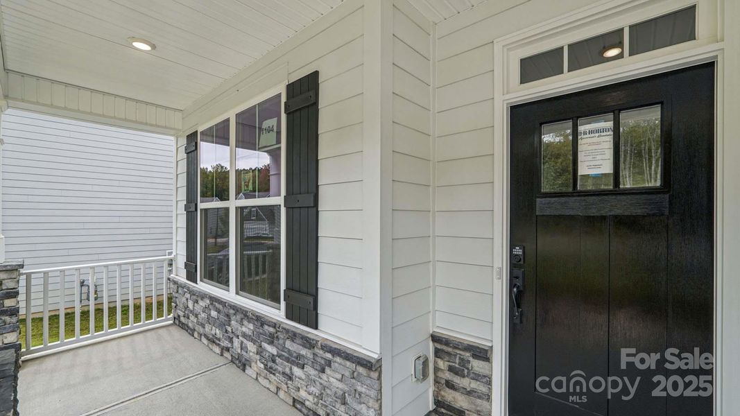 Exterior details and patio area of a home in Falls Cove, Troutman (Image 21).
