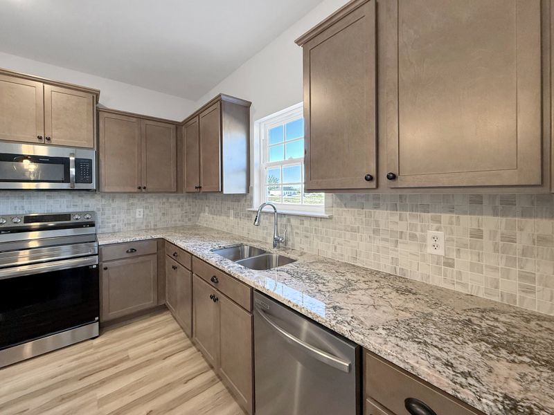 Furnished interior view inside a new home in The Village at Sassafras, Allenhurst (Image 5).
