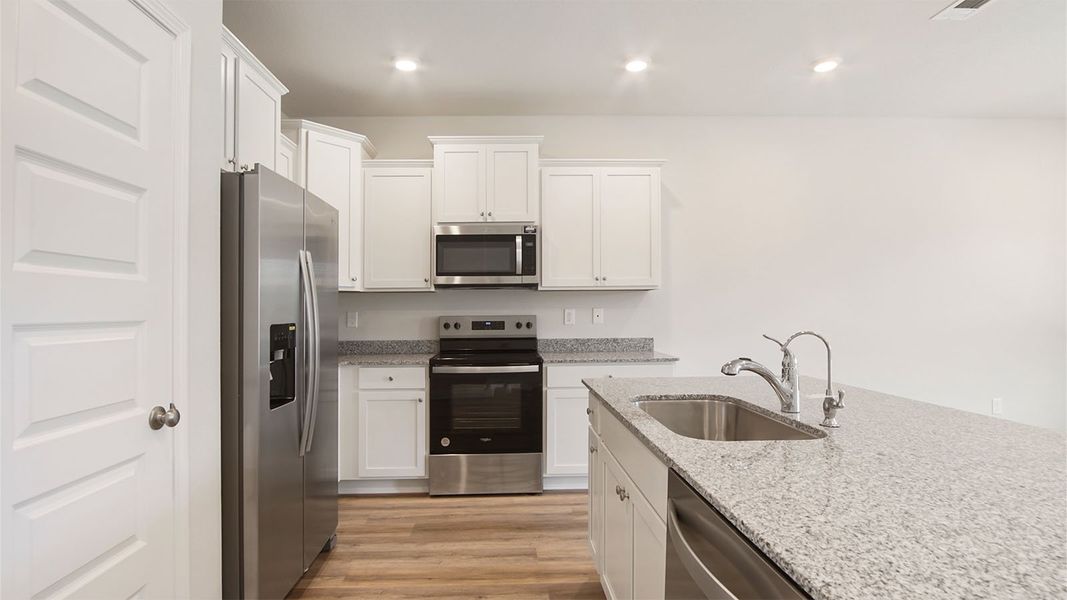 Representative furnished interior of a home built from the Palm Interior by D.R. Horton in Caballeros Estates Townhomes at Hombre, Panama City Beach (Image 10). Representative furnished interior of a home built from the Palm Interior by D.R. Horton in Caballeros Estates Townhomes at Hombre, Panama City Beach (Image 10).
