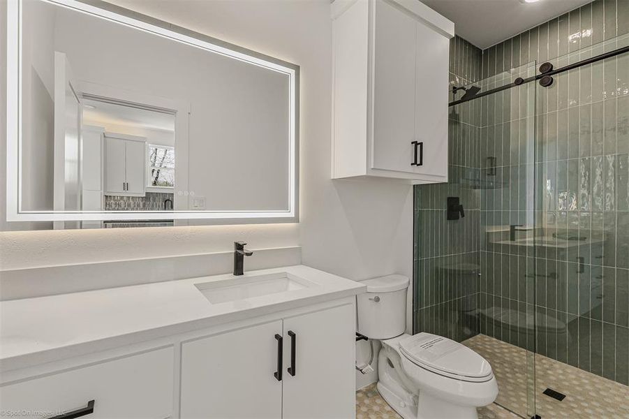 Full bath with tiled oversized shower