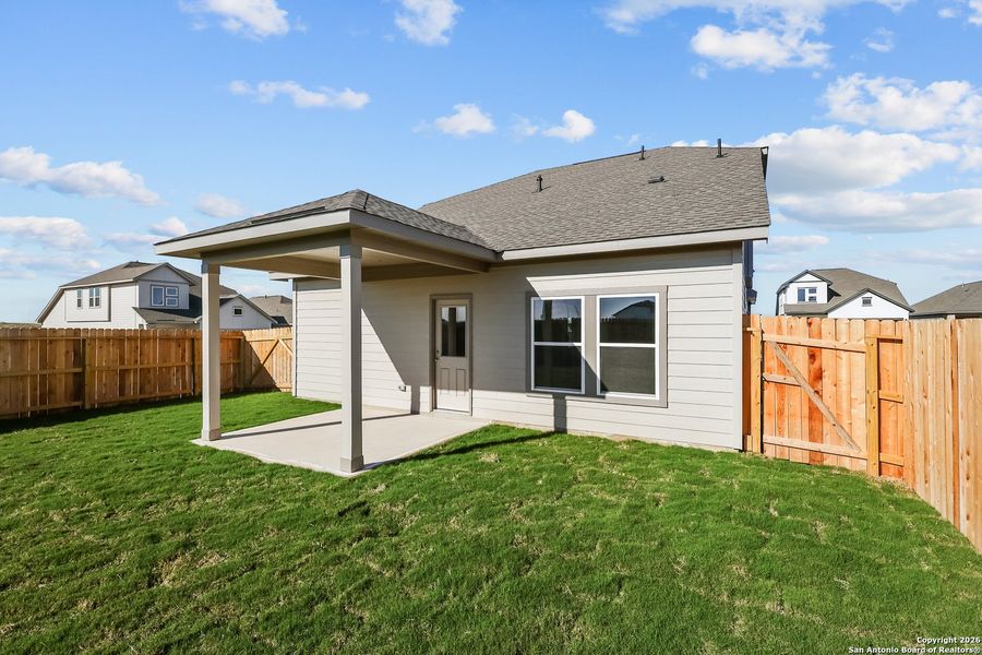 Exterior details and patio area of a home in Garden Grove, Schertz (Image 21).