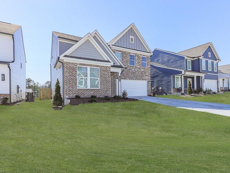Front exterior of a new home in Kingsley, Acworth, GA, highlighting curb appeal (Image 29).
