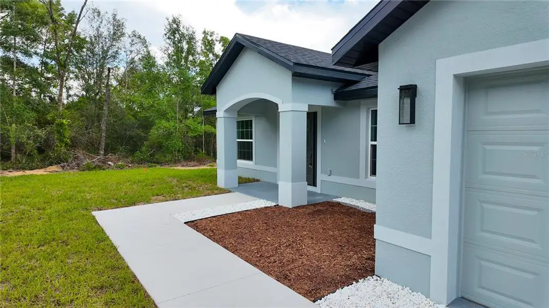 Exterior details and patio area of a home in , Ocala (Image 3).