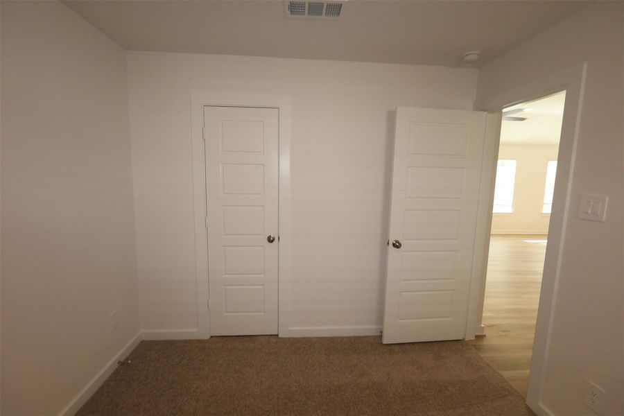 Spacious, unfurnished interior of a new home in Pinewood at Grand Texas, New Caney (Image 24).