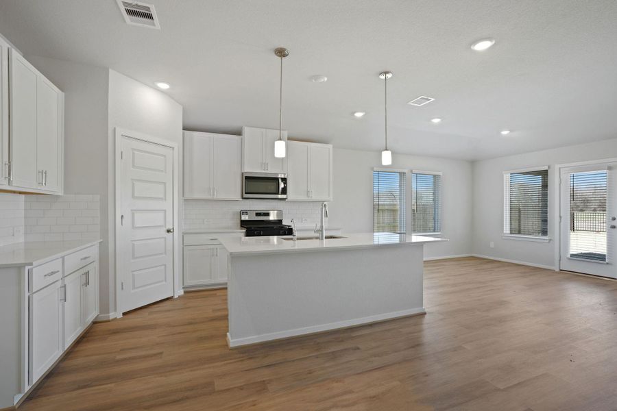Furnished interior view inside a new home in Pine Lake Cove - Classic Series, Montgomery (Image 9).