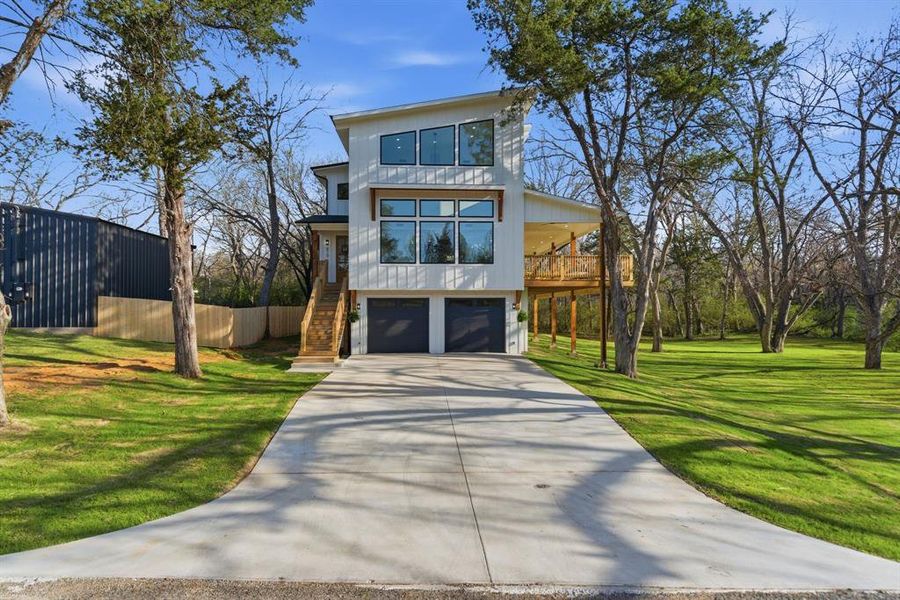 Front exterior of a new home in , Denison, TX, highlighting curb appeal (Image 25).