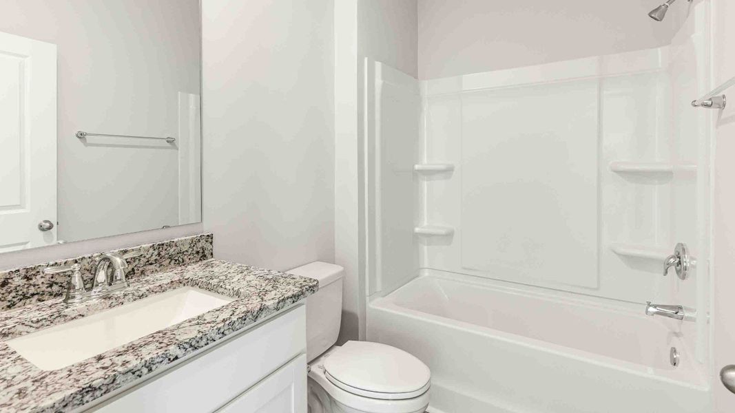 Furnished interior view inside a new home in Cedar Hill Landing, Navassa (Image 11). Furnished interior view inside a new home in Cedar Hill Landing, Navassa (Image 11).