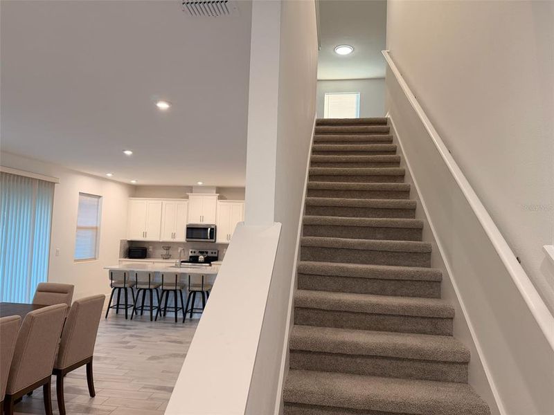 Furnished interior view inside a new home in Waterbrooke, Clermont (Image 11).
