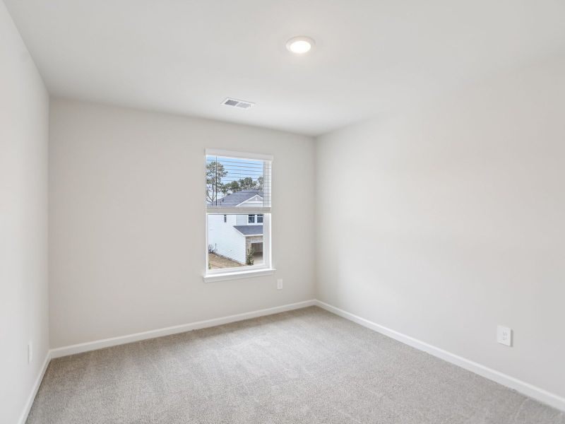 Spacious, unfurnished interior of a new home in Hawthorne Station, College Park (Image 19).