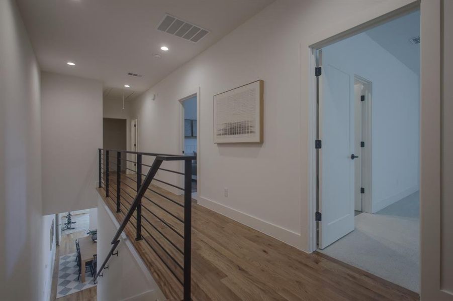 Hallway featuring light hardwood / wood-style flooring