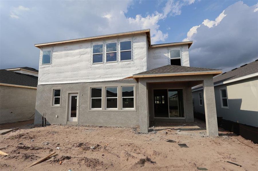 In-progress construction of a new home in Center Lake on the Park, St. Cloud, FL (Image 20).