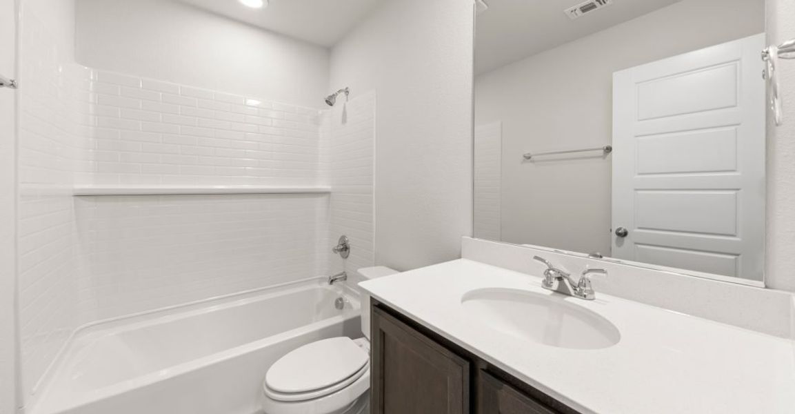 Representative exterior photo of a completed home built from the Whitney by Impression Homes in Creekshaw, Royse City, TX (Image 15). Representative exterior photo of a completed home built from the Whitney by Impression Homes in Creekshaw, Royse City, TX (Image 15).