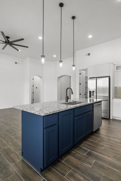 Representative furnished interior of a home built from the Scottsdale by LEH. Homes in Verdancia, El Paso (Image 13).