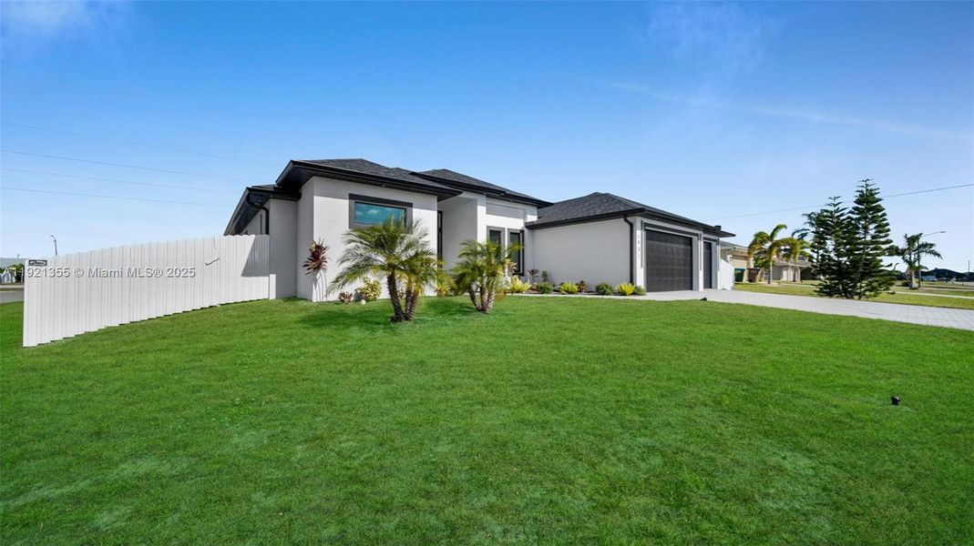 Front exterior of a new home in , Cape Coral, FL, highlighting curb appeal (Image 25).