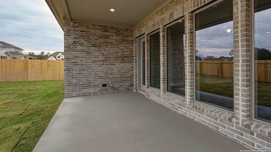 Exterior details and patio area of a home in Kallison Ranch, San Antonio (Image 21).