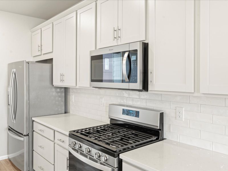 Furnished interior view inside a new home in Three Hills, Morrison (Image 3).