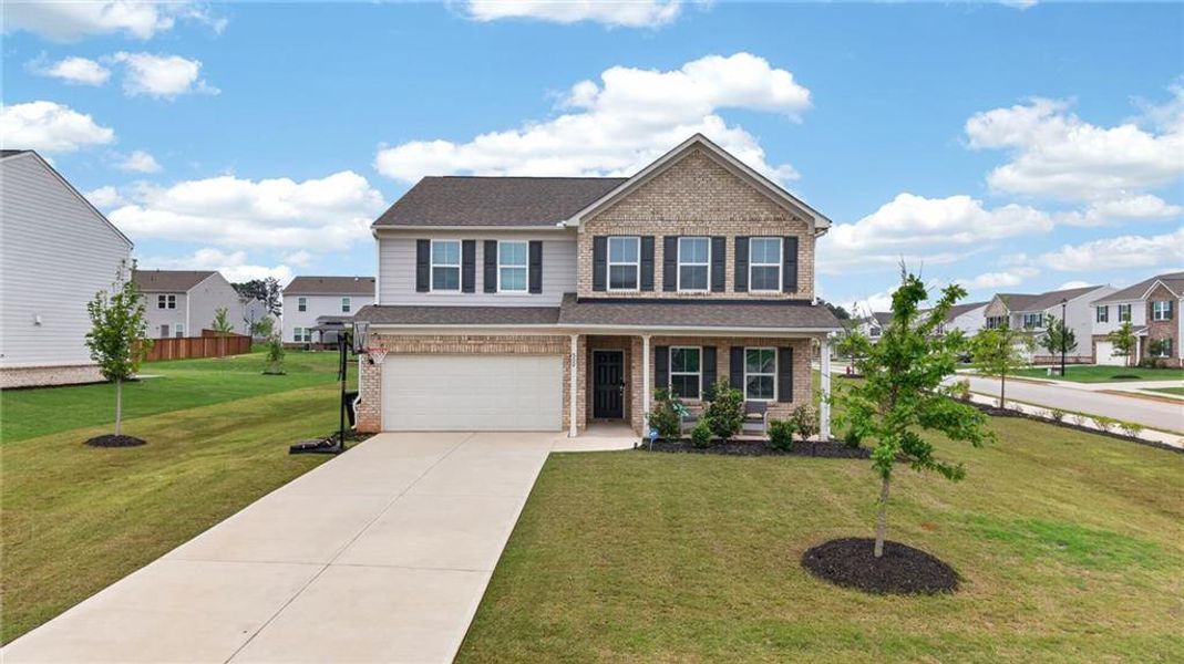Front exterior of a new home in , McDonough, GA, highlighting curb appeal (Image 26).