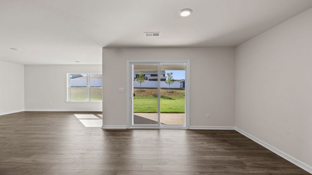 Spacious, unfurnished interior of a new home in Bentley Park, Greenwood (Image 23).