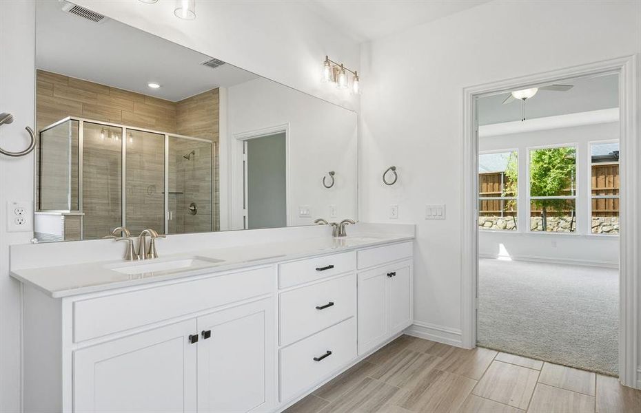Primary suite with double vanity