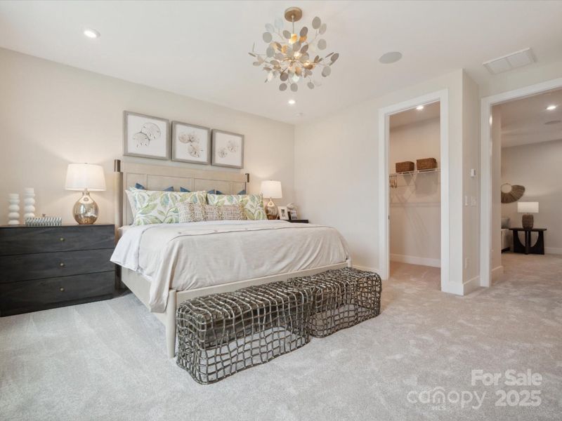 Primary suite complete with 9' ceilings. *Model Photos | Actual finishes, structural selections, and orientation may vary.