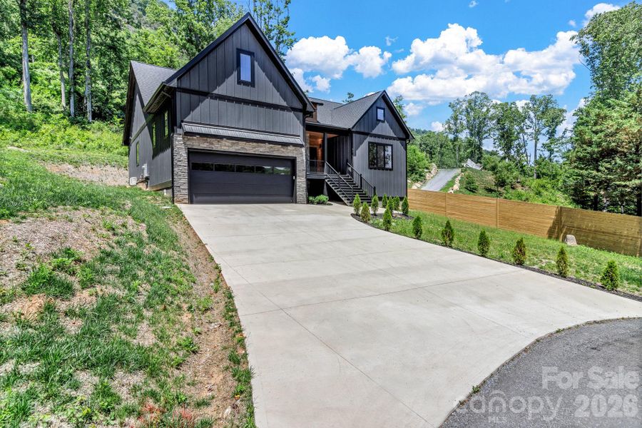 Front exterior of a new home in , Fairview, NC, highlighting curb appeal (Image 26).