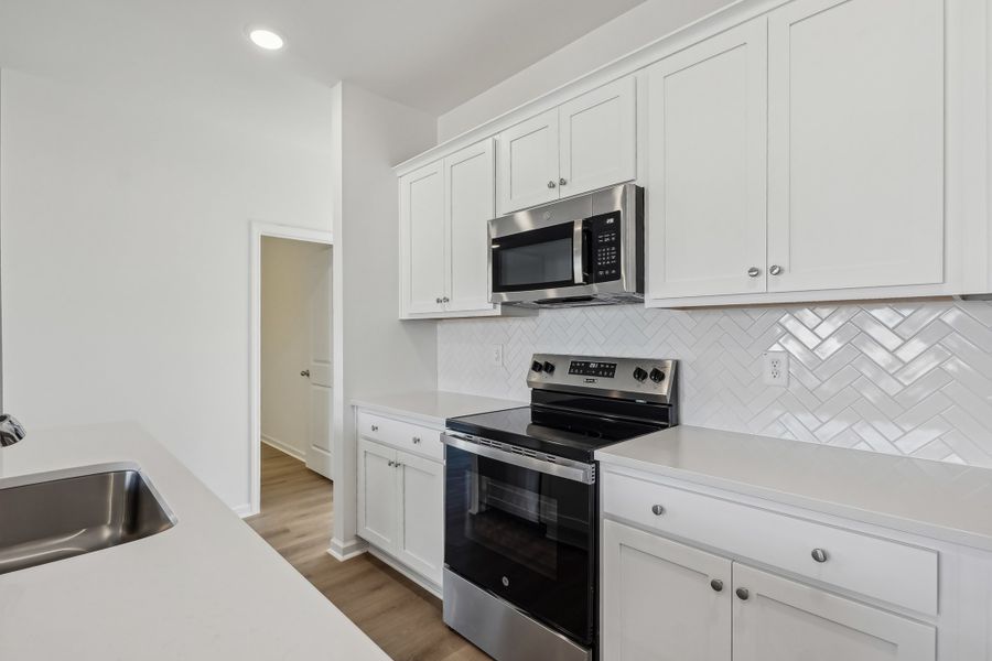 Representative furnished interior of a home built from the Timber by Ashton Woods in Middleton Farms, Middlesex (Image 5).