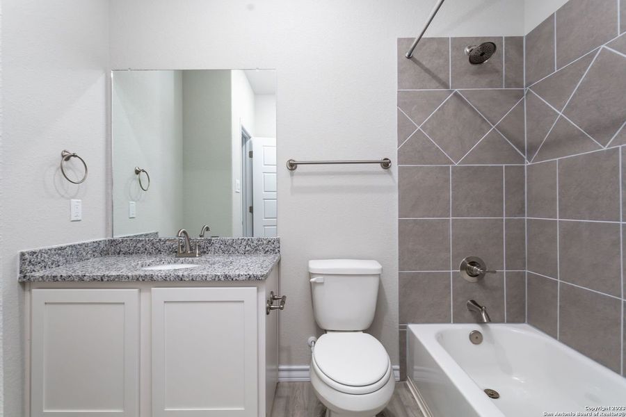 Furnished interior view inside a new home in , Seguin (Image 6).