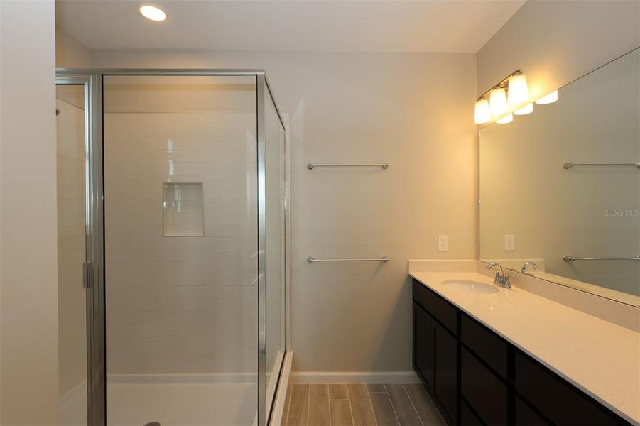 Furnished interior view inside a new home in Tribute at Ovation, Winter Garden (Image 8).