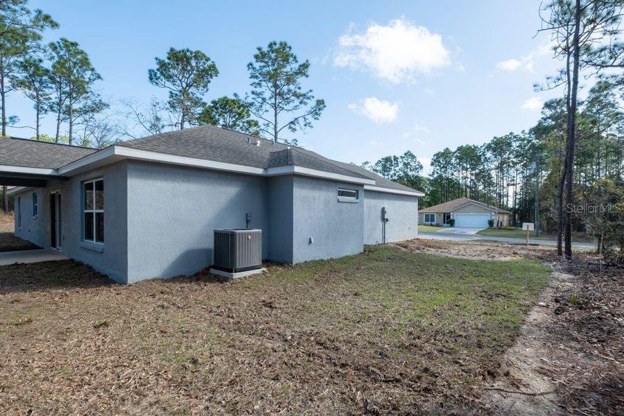 Exterior details and patio area of a home in , Citrus Springs (Image 28).