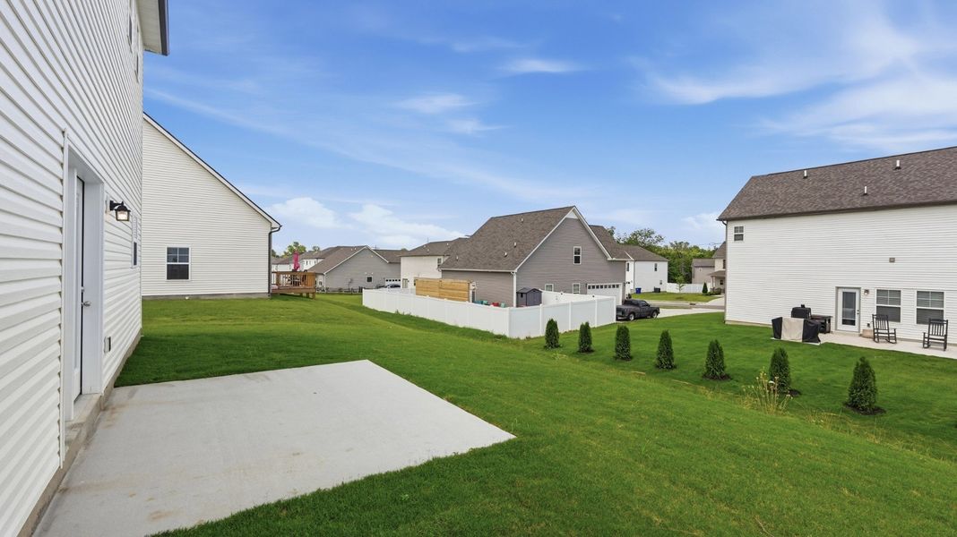 Exterior details and patio area of a home in Wheatfield, Shelbyville (Image 4).
