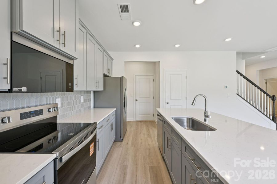 Photo is not of the actual home, but is an inspirational photo of builder’s model home and may depict options, furnishings, and/or decorator features that are not included Photo is not of the actual home, but is an inspirational photo of builder’s model home and may depict options, furnishings, and/or decorator features that are not included