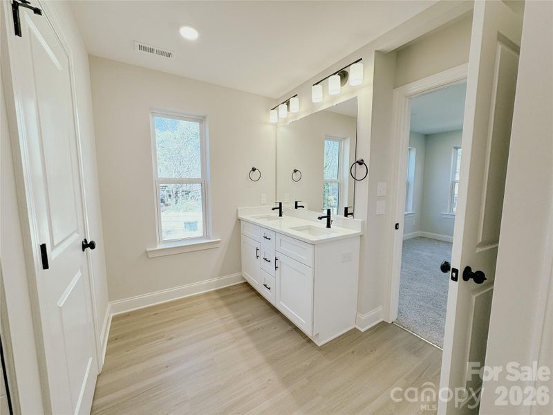 Furnished interior view inside a new home in , Huntersville (Image 11).