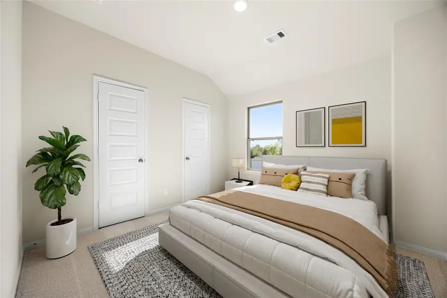 This inviting secondary bedroom offers comfort and a clean, modern aesthetic. The room features soft, neutral-toned carpeting, painted in a bright, neutral color palette, and a double door closet offering plenty of space. *Virtually Staged This inviting secondary bedroom offers comfort and a clean, modern aesthetic. The room features soft, neutral-toned carpeting, painted in a bright, neutral color palette, and a double door closet offering plenty of space. *Virtually Staged