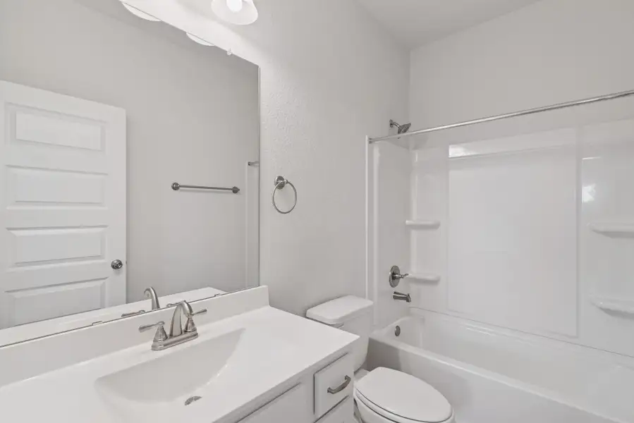 The Blue Jay II- Hall Bath. Home under construction. Sample floor plan photo used for illustrative purposes only. Upgrades, selections options, and colors will vary. The Blue Jay II- Hall Bath. Home under construction. Sample floor plan photo used for illustrative purposes only. Upgrades, selections options, and colors will vary.