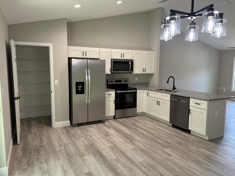Furnished interior view inside a new home in , Dunnellon (Image 5).
