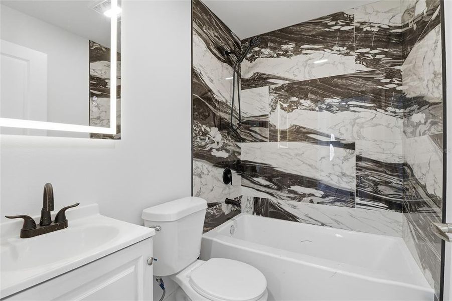 Furnished interior view inside a new home in , Port Charlotte (Image 13).