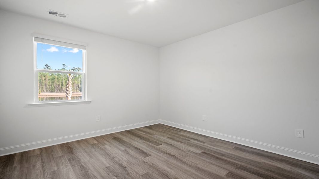 Representative unfurnished interior of a home built from the Hemingway-Exp by D.R. Horton in The Lakes at North Glynn, Brunswick (Image 25).