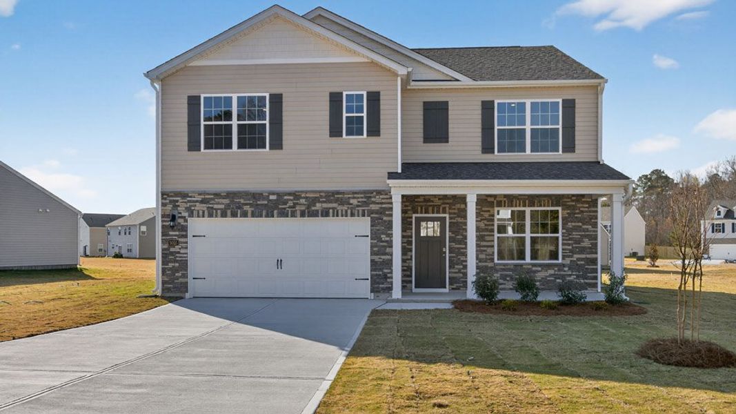 Representative exterior photo of a completed home built from the HAYDEN by D.R. Horton in North Gate, Vass, NC (Image 6).