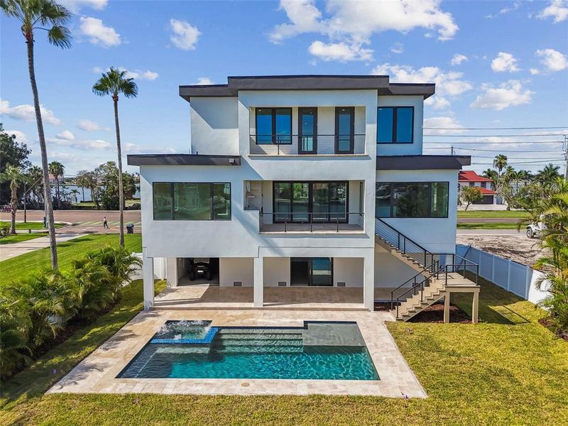 Front exterior of a new home in , Treasure Island, FL, highlighting curb appeal (Image 24). Front exterior of a new home in , Treasure Island, FL, highlighting curb appeal (Image 24).