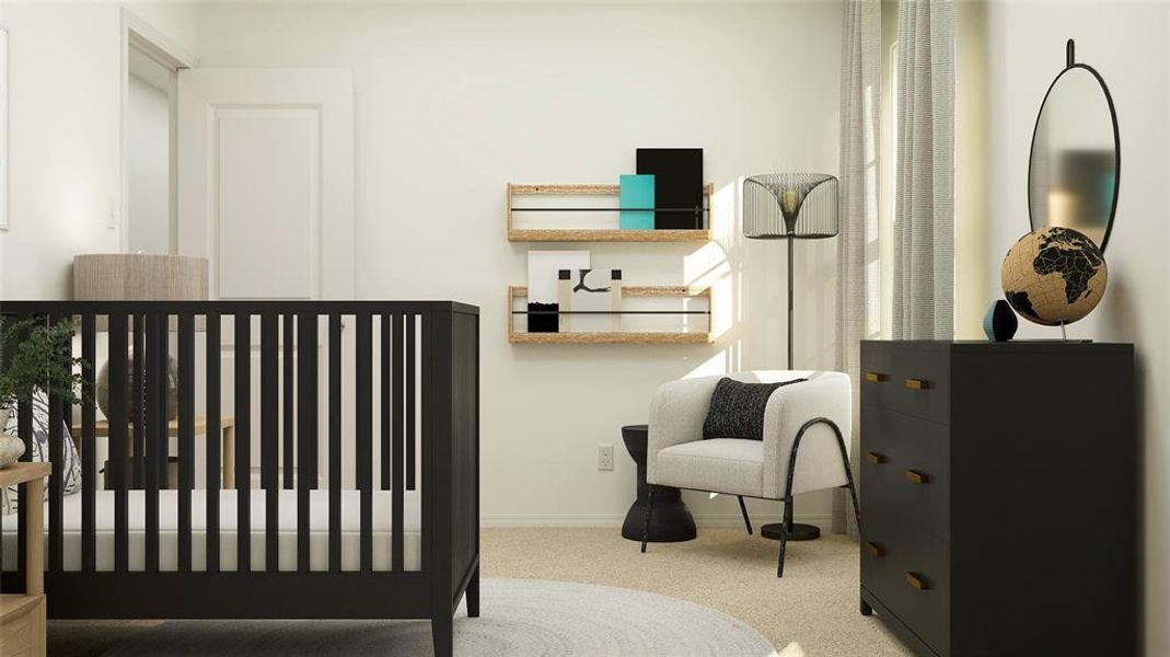 Bedroom with a crib and carpet floors