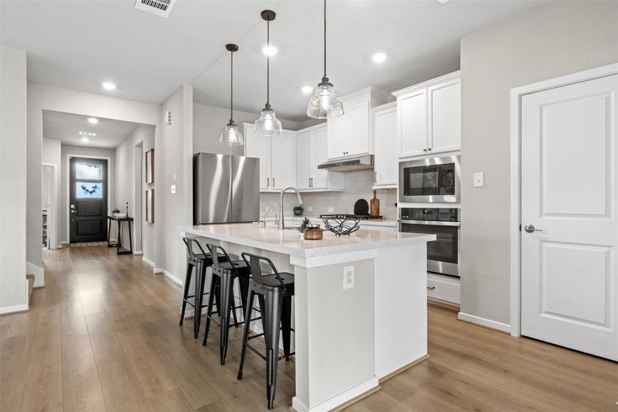 Kitchen and views of the front of the home Kitchen and views of the front of the home