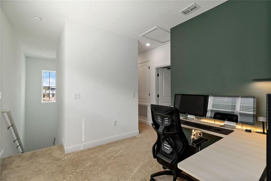 Furnished interior view inside a new home in Weslyn Park at Sunbridge (Craft Homes), St. Cloud (Image 43).