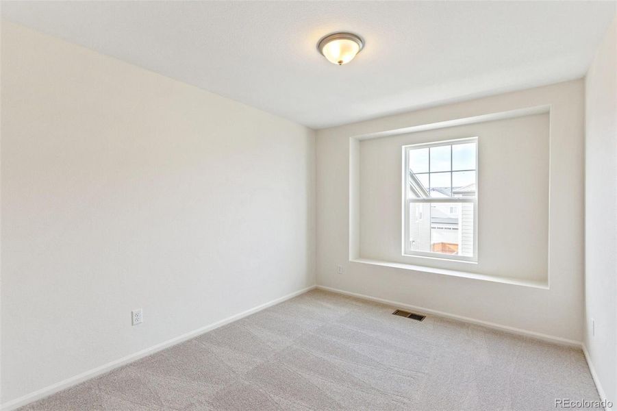 Spacious, unfurnished interior of a new home in Sky Ranch Villas, Watkins (Image 18).