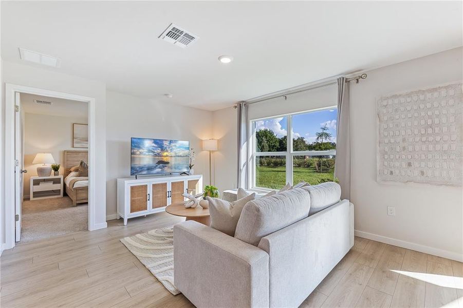 Furnished interior view inside a new home in Central Parc, North Port (Image 10).