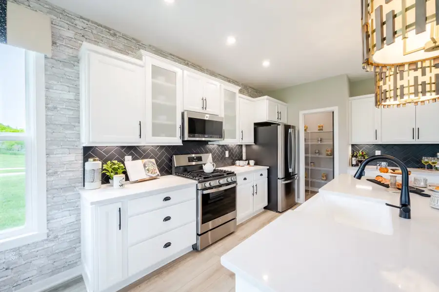 Representative furnished interior of a home built from the Calvin by Fischer Homes in Pickens Bluff, Hiram (Image 35).