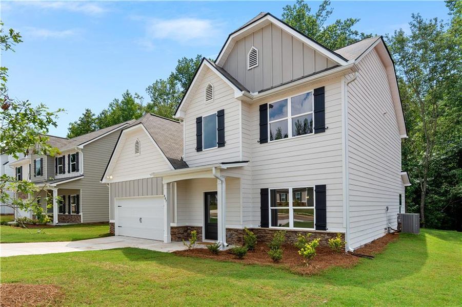 Front exterior of a new home in , Villa Rica, GA, highlighting curb appeal (Image 2). Front exterior of a new home in , Villa Rica, GA, highlighting curb appeal (Image 2).