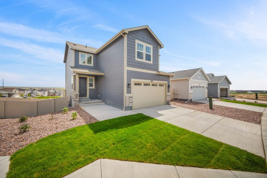 Front exterior of a new home in Trails at Aspen Ridge-3, Colorado Springs, CO, highlighting curb appeal (Image 21).
